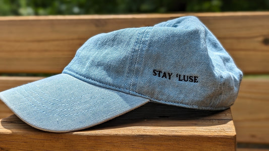 Side View of Light Denim Hat Out in the Sun