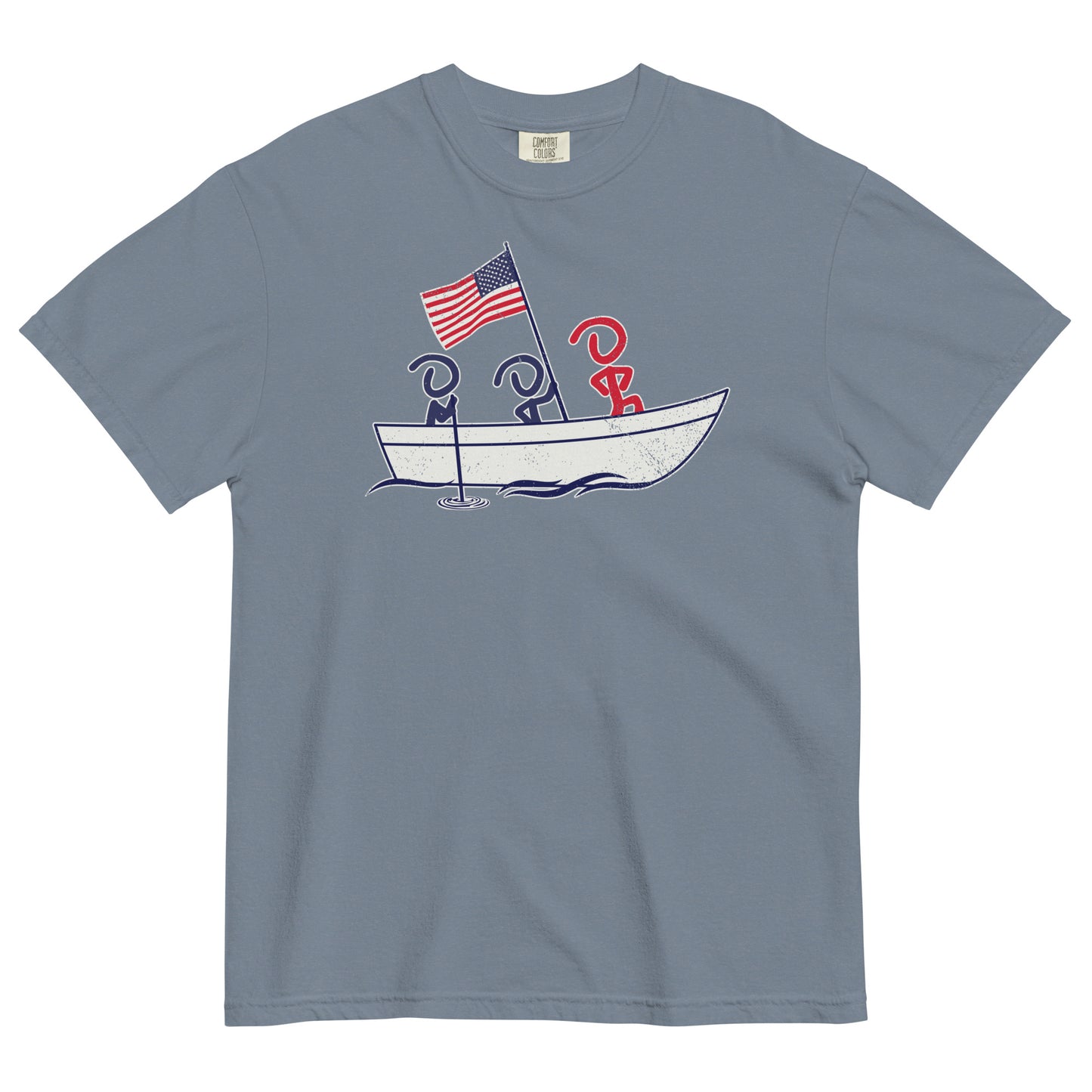 A gray blue short sleeve t-shirt laid flat. Front graphic shows three Jaunty Men in a simple boat carrying an American flag, similar to George Washington crossing the Delaware.