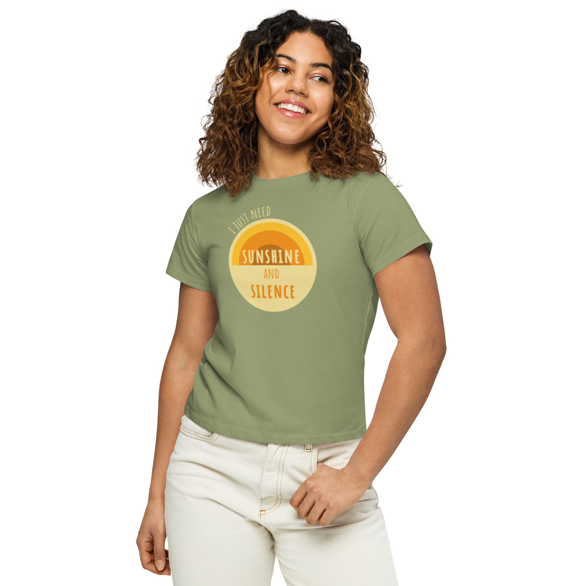 Woman posing in artichoke premium high-waisted t-shirt. "I just need sunshine and silence" written atop a light yellow circle with a semi-circular sun design.